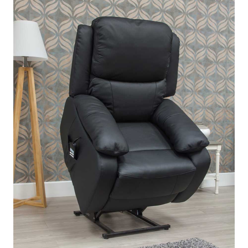 Black leather lift and rise recliner chair in a room with patterned wallpaper.