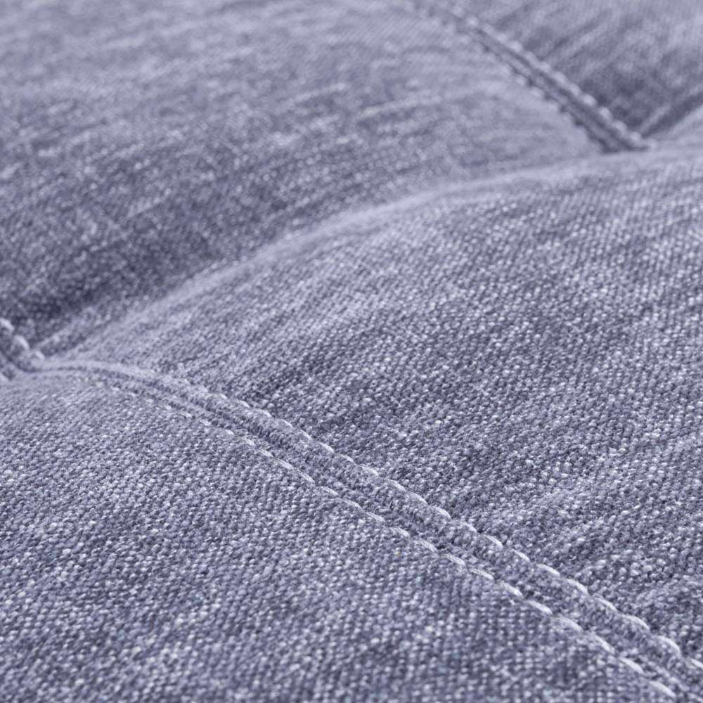 Close-up of grey fabric with stitching detail