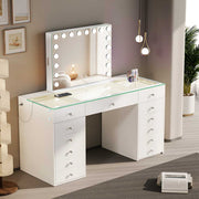 White vanity desk with illuminated mirror in a room setting.
