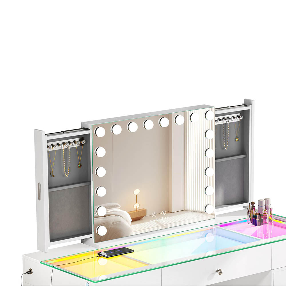 LED vanity mirror with sliding panels for jewelry storage. these hide neatly inside the mirror when not in use. 