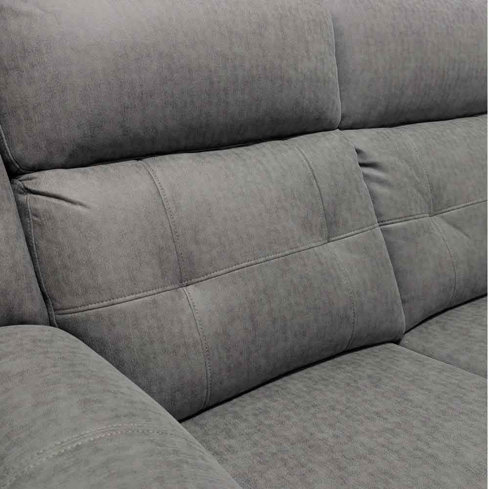 Gray fabric sofa with quilted pattern