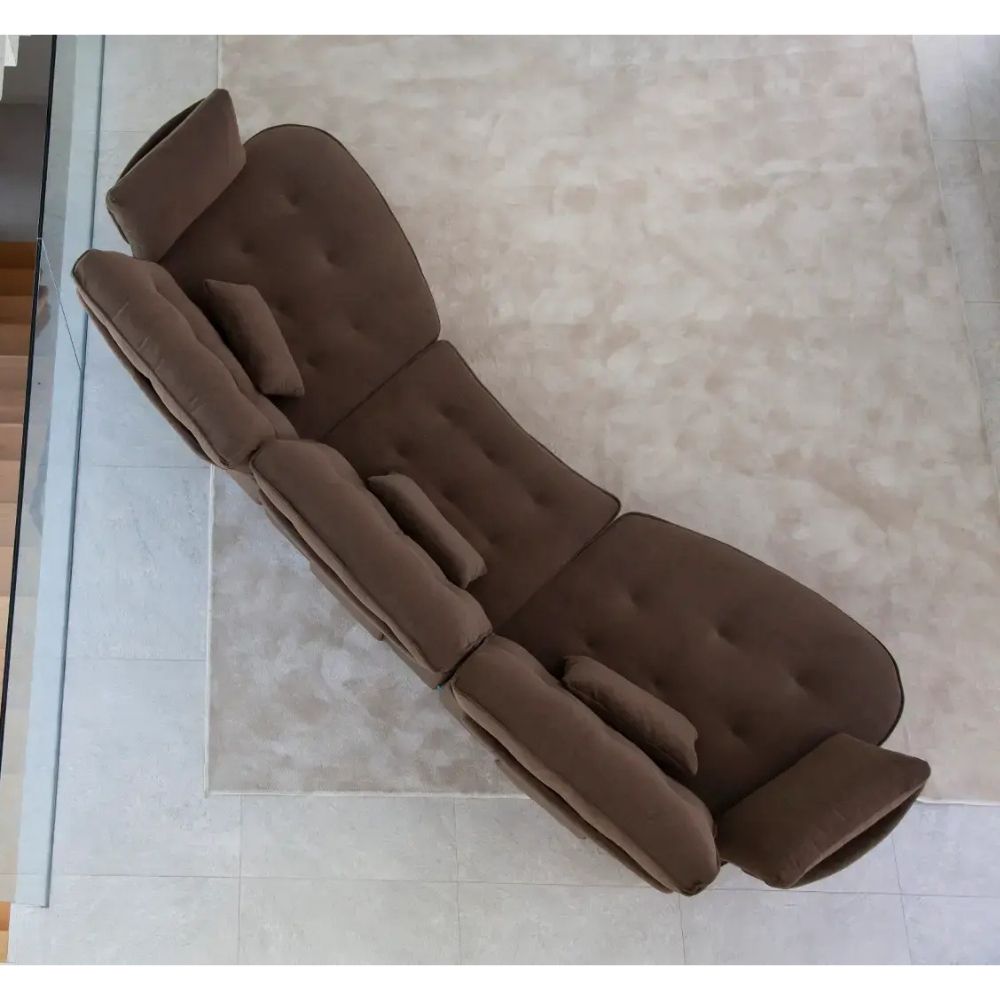 A brown tufted reclining sofa or chaise lounge chair shown from an overhead angle on a light beige rug over a tiled floor.