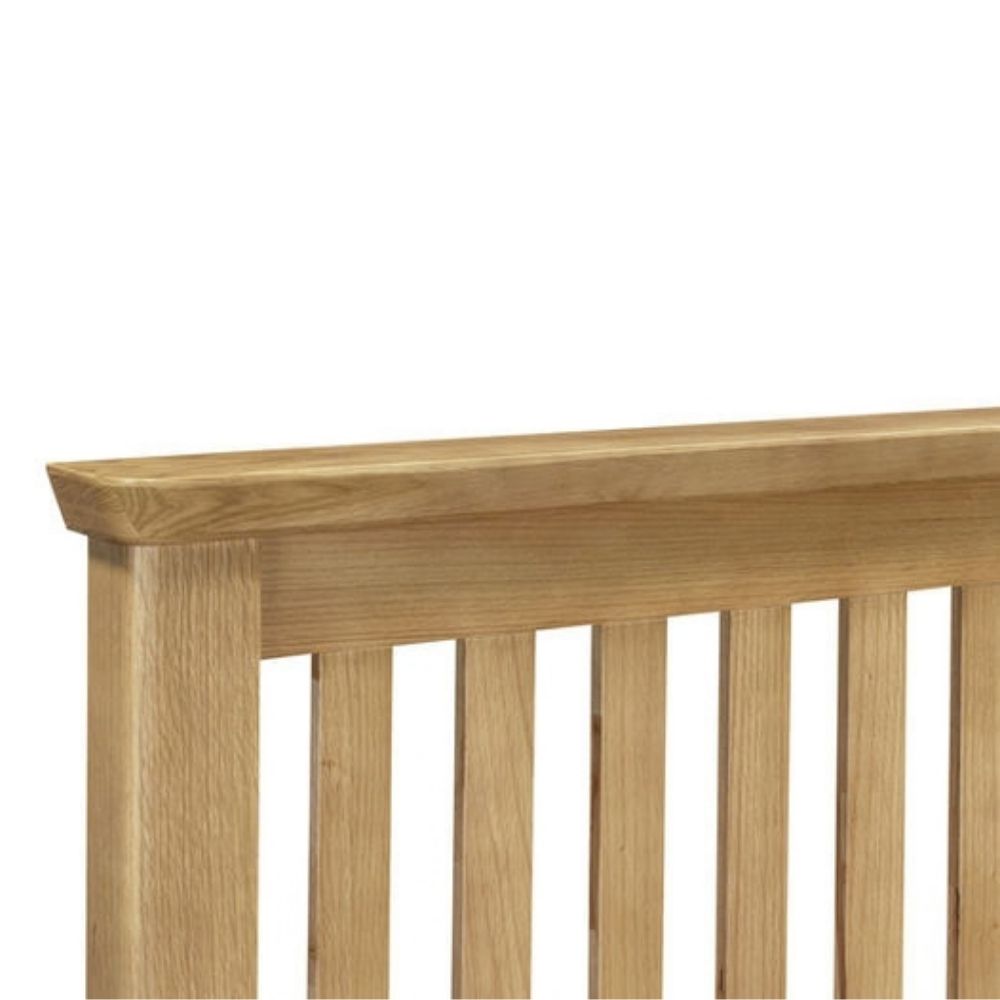 Close up of oak slatted headboard