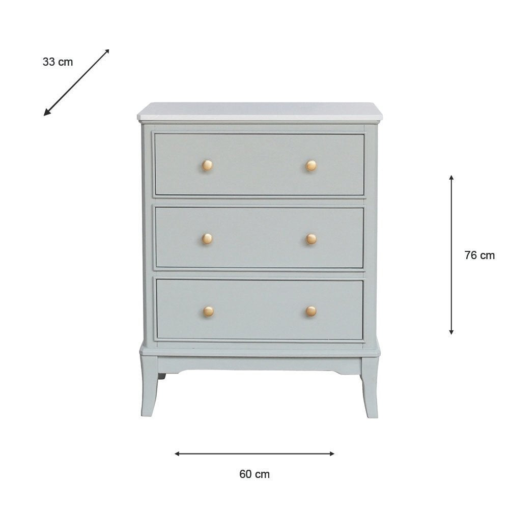 A three-drawer chest of drawers in a light sage green finish with small round gold knobs, shown with dimension arrows and labels indicating 60 cm width, 76 cm height, and 33 cm depth on a white background.