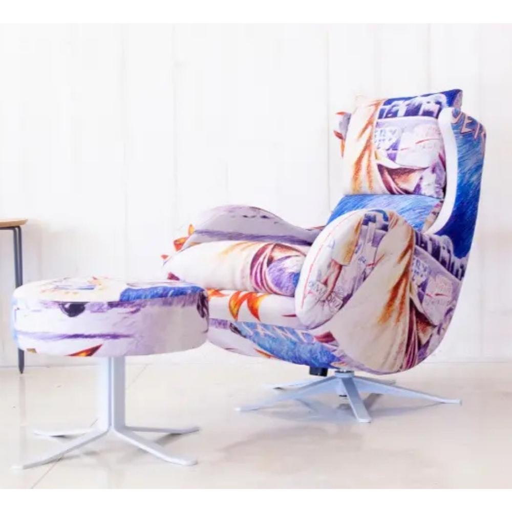 A modern lounge chair with a matching footstool, upholstered in a colorful abstract print featuring blue, purple, orange, and white. The chair has a light blue swivel base, set against a clean white paneled wall and light floor.