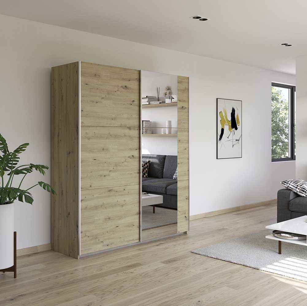 Wooden wardrobe with mirror door in a living room setting