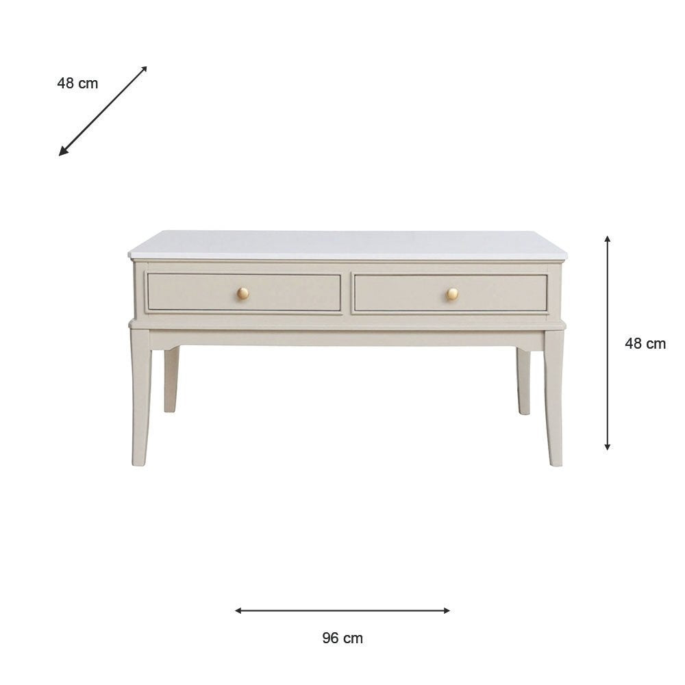 A light beige / stone coloured coffee table with two drawers and small gold knobs, shown with dimension lines indicating 48 cm height, 48 cm width, and 96 cm depth on a white background.