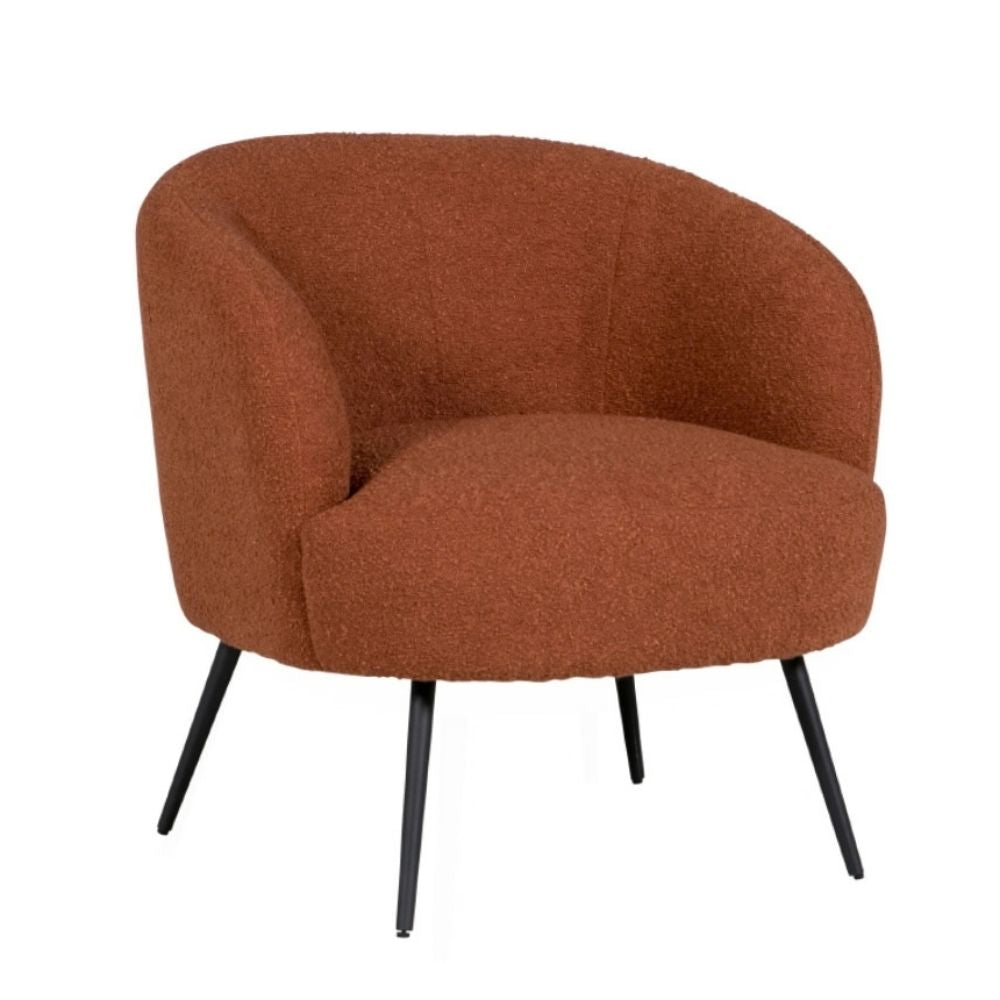 A modern barrel-style accent chair upholstered in a textured terracotta-brown bouclé fabric, supported by four slim black metal legs, shown against a plain white background.