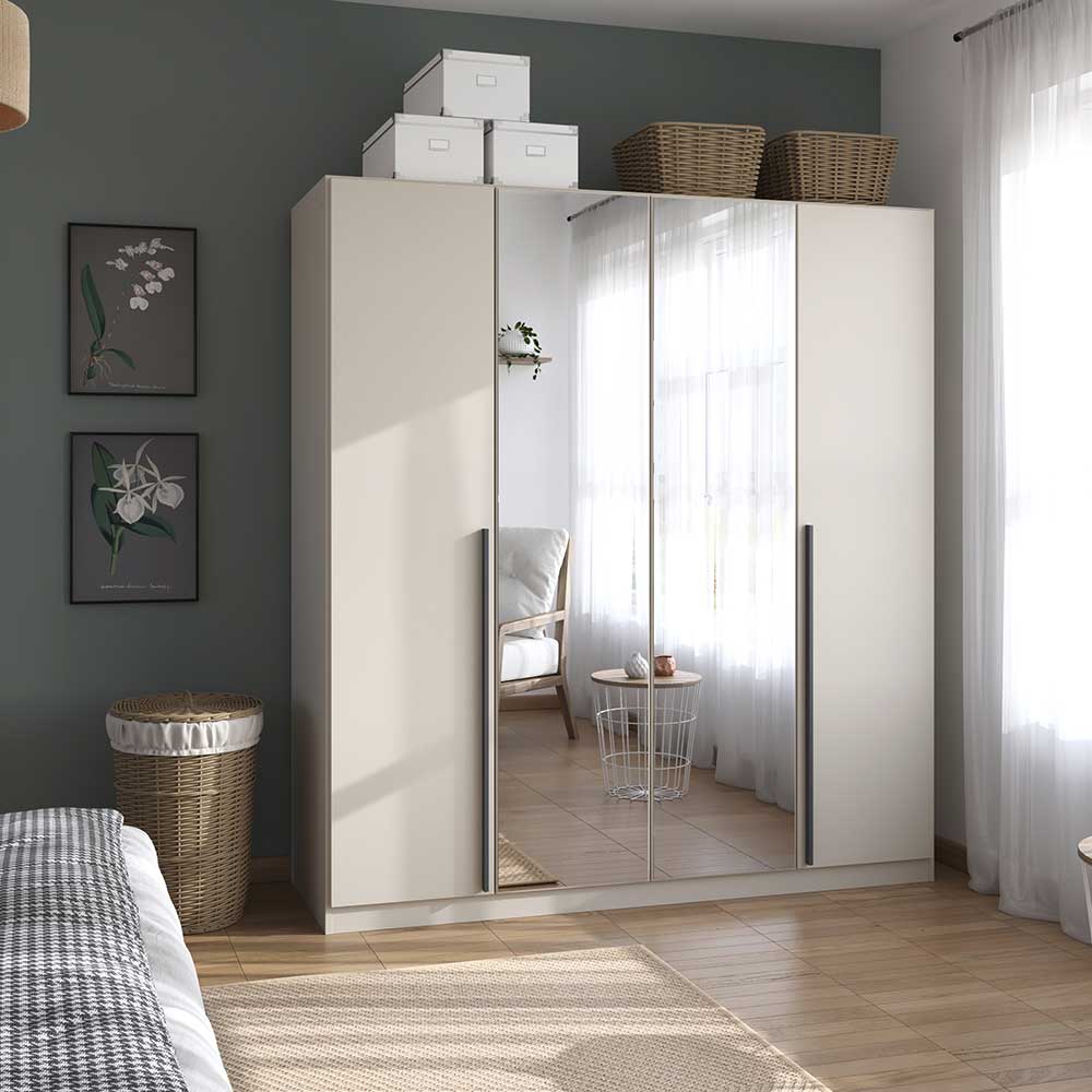 White wardrobe with mirror in a bedroom setting