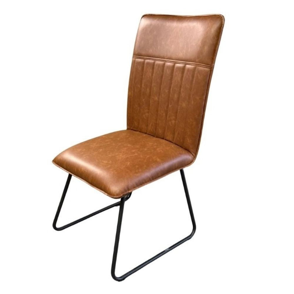 contemporary Alfie Dining Chair in Cognac padded upholstry with a black frame leg. 