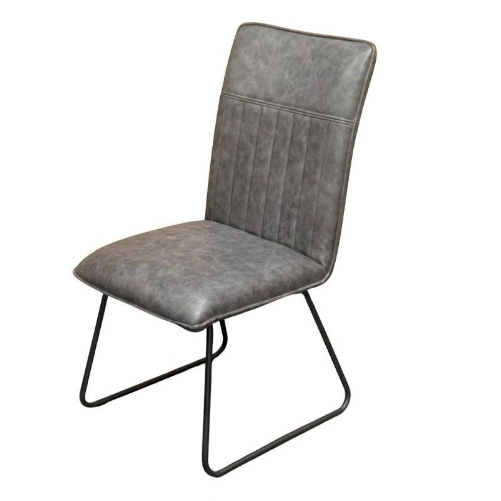 contemporary Alfie Dining Chair in grey padded upholstry with a black frame leg. 