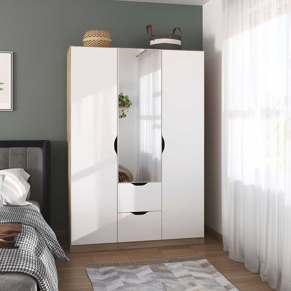 White 3 door wardrobe with white doors, oak frame, and central 3/4 length mirror above 2 storage drawers in a bedroom setting