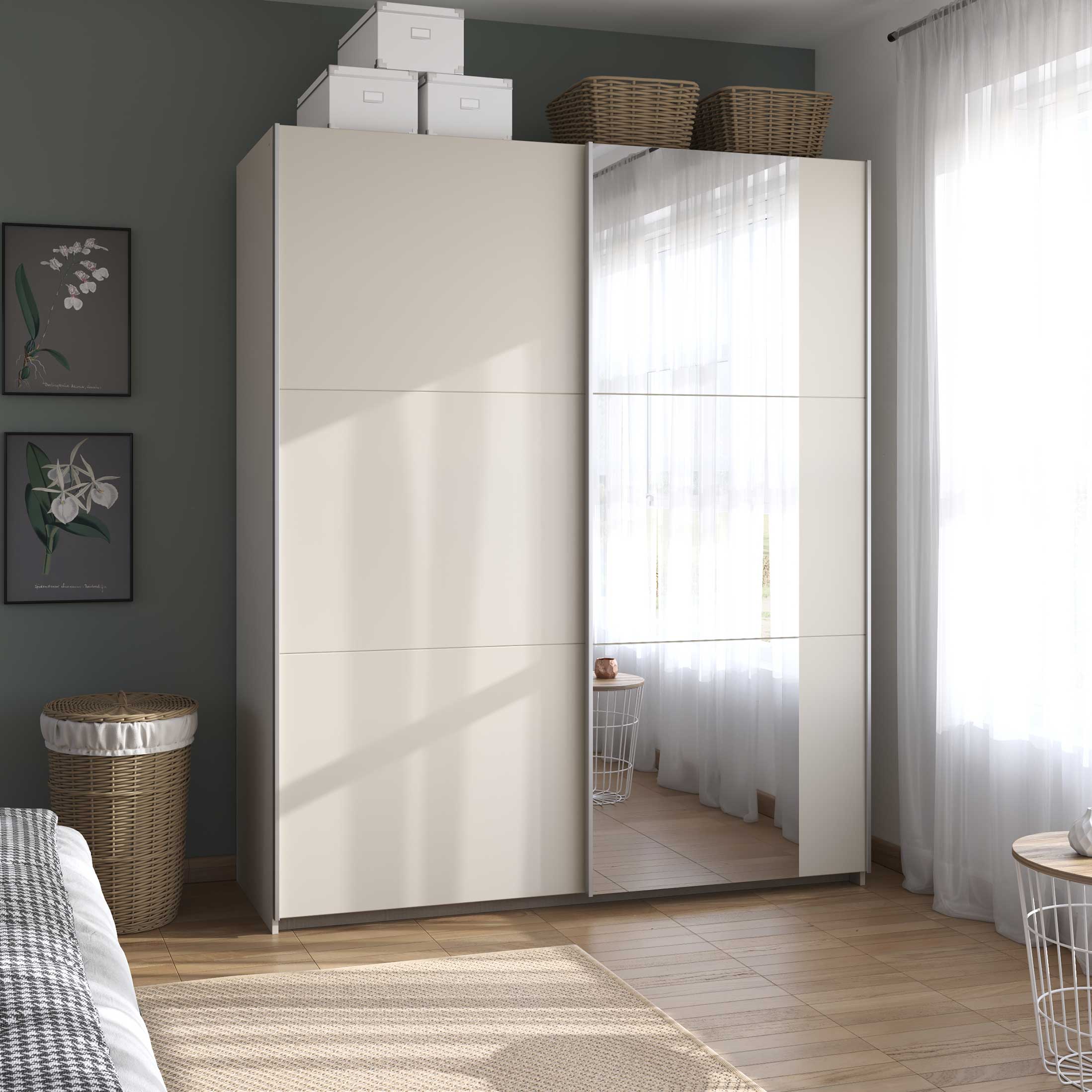 Champagne sliding wardrobe with mirror in a bedroom setting