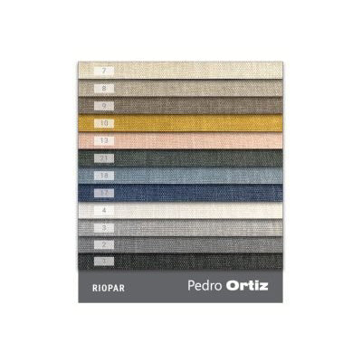 Color swatch card with various fabric textures and colors by Pedro Ortiz on a white background.