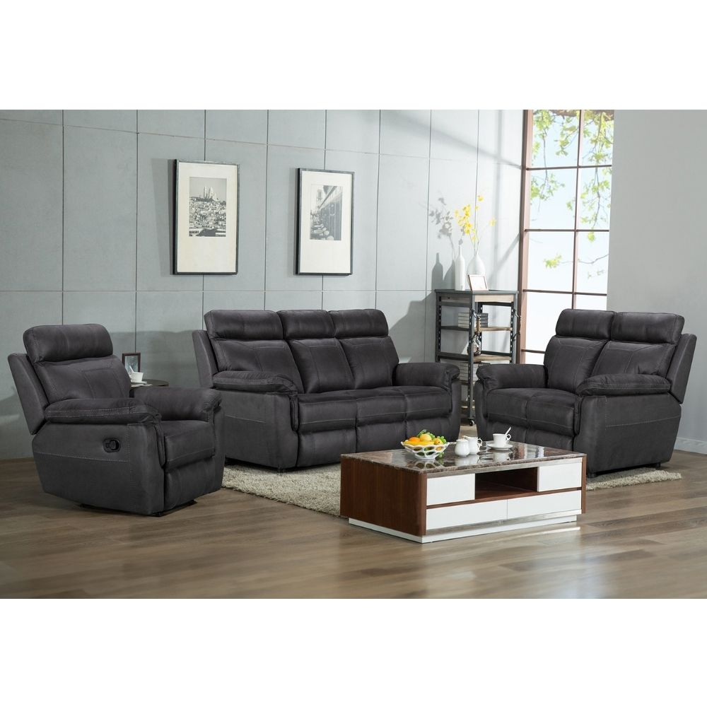 Gray reclining sofa set in a living room with a wooden coffee table.