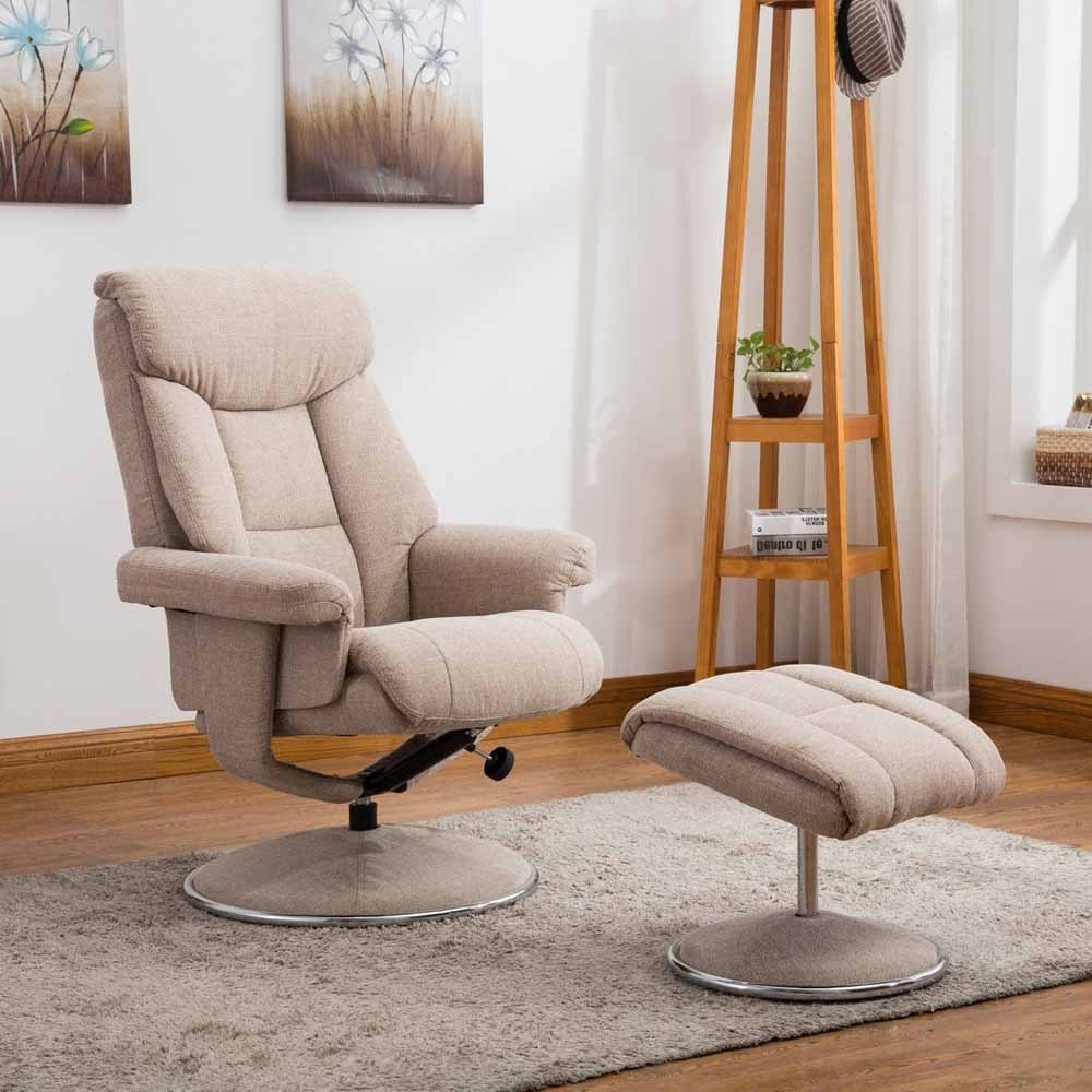 Beige recliner chair with footstool in a living room setting
