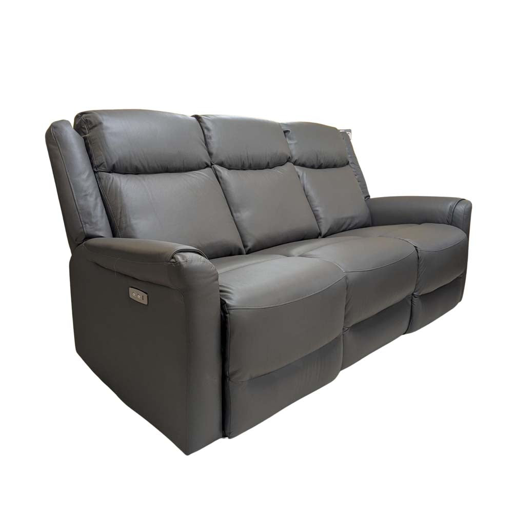 Grey reclining leather sofa on a white background
