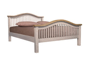 Bedframe with curved headboard and footboard. Painted with Oak tops