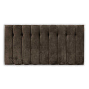 Brown upholstered headboard on a white background