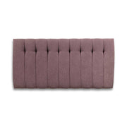 Lilac tufted headboard on a white background