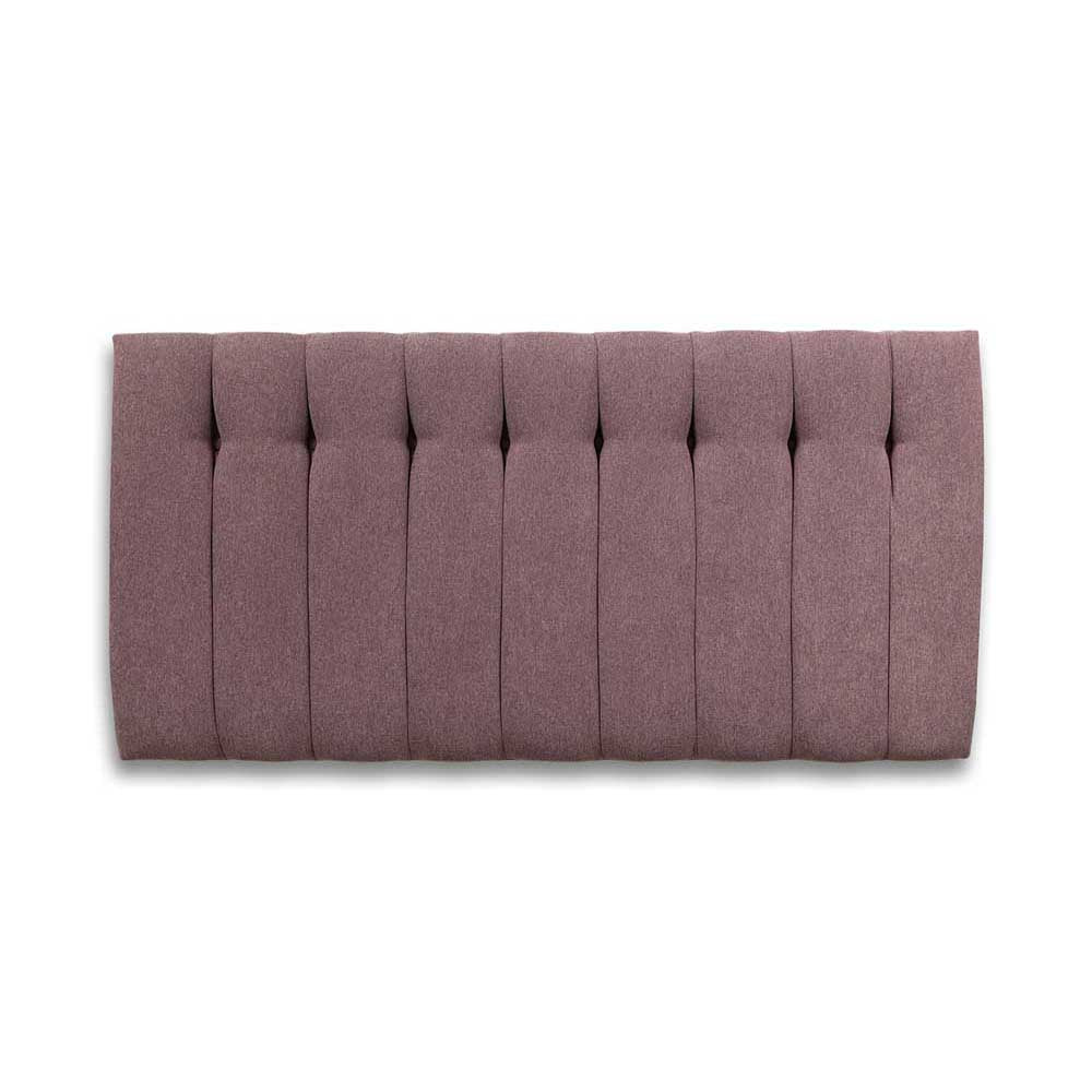 Lilac tufted headboard on a white background