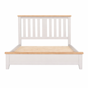 Wooden bed with white frame and wooden slats on a white background