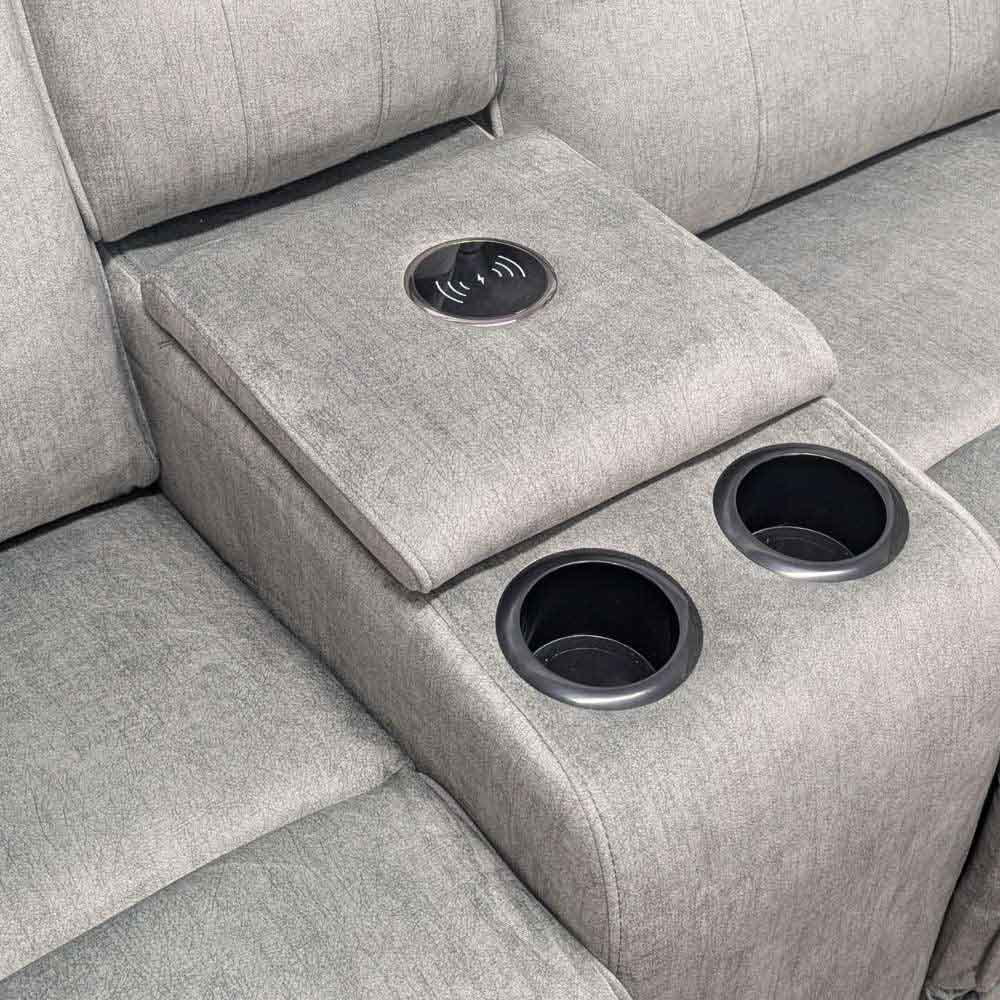 Close up of sofa cup holders and wireless phone charging plate