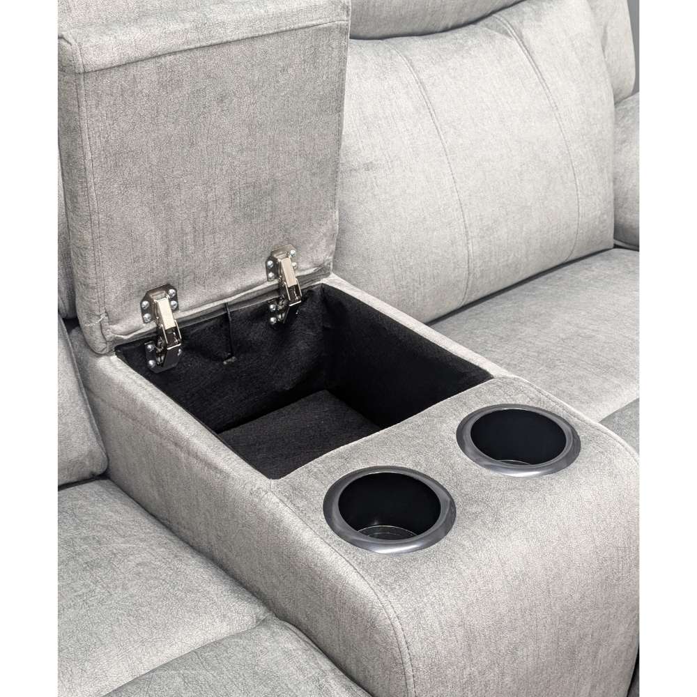 Close up of consealed sofa storage underneath wireless charging plate / centre console / armrest