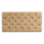 Beige tufted headboard on a white background