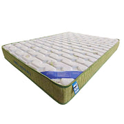 Mattress with green exterior and white interior on a white background