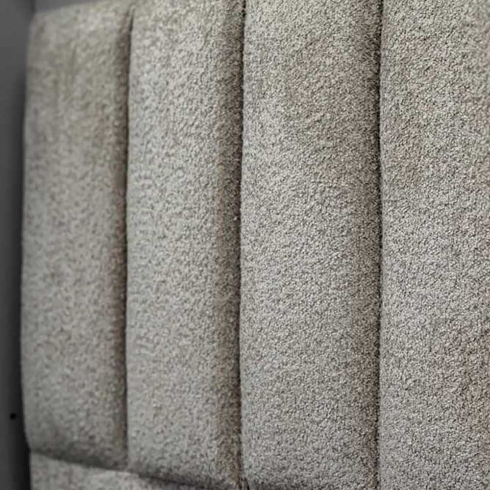 Close-up of textured gray headboard