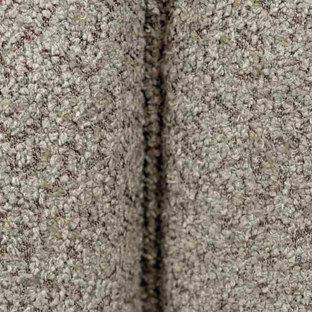 Close-up of a headboard texture with a visible seam.