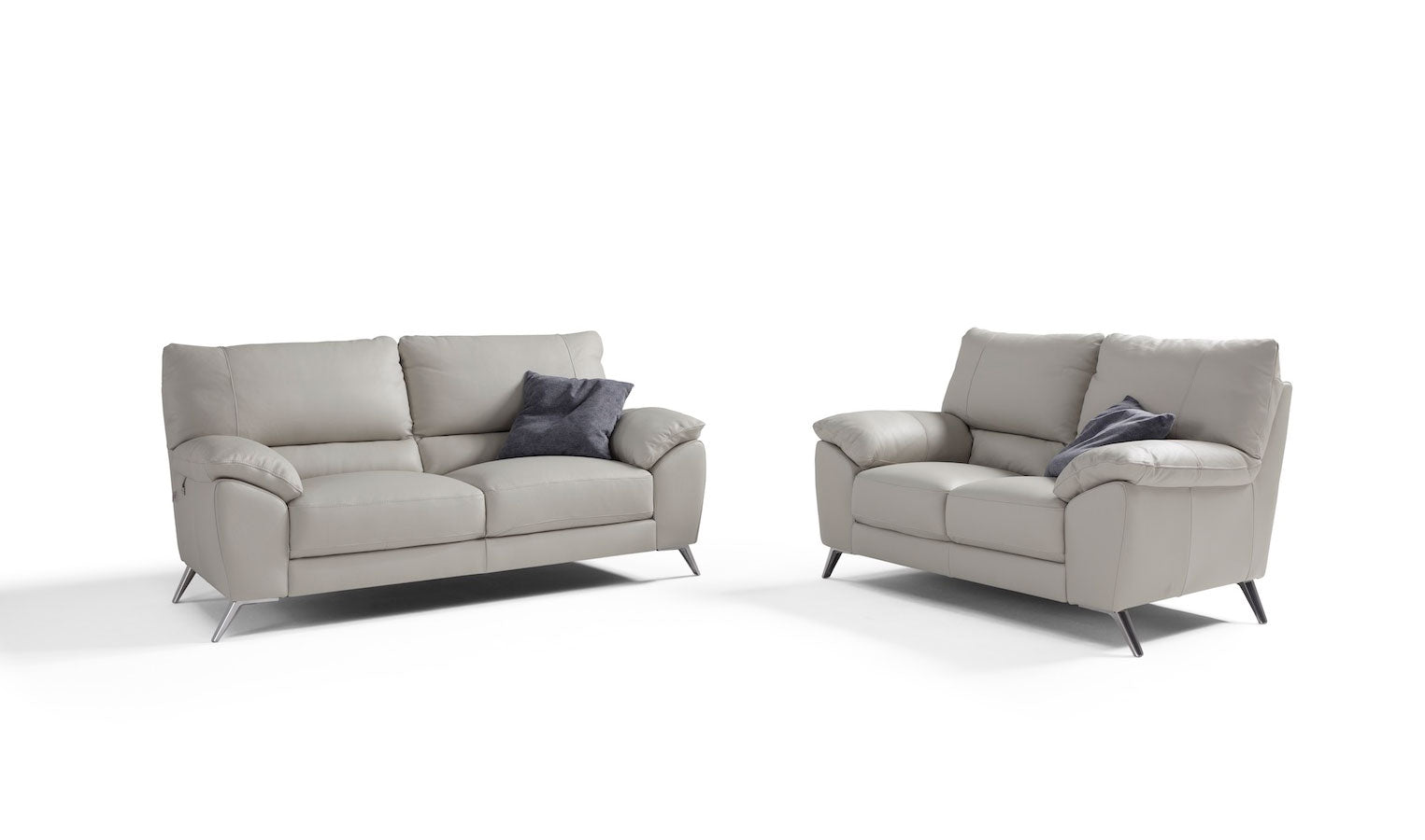 New Trend Concepts model Envy 2 Seater and 3 Seater Leather recliner in Light Grey With Chrome leg.