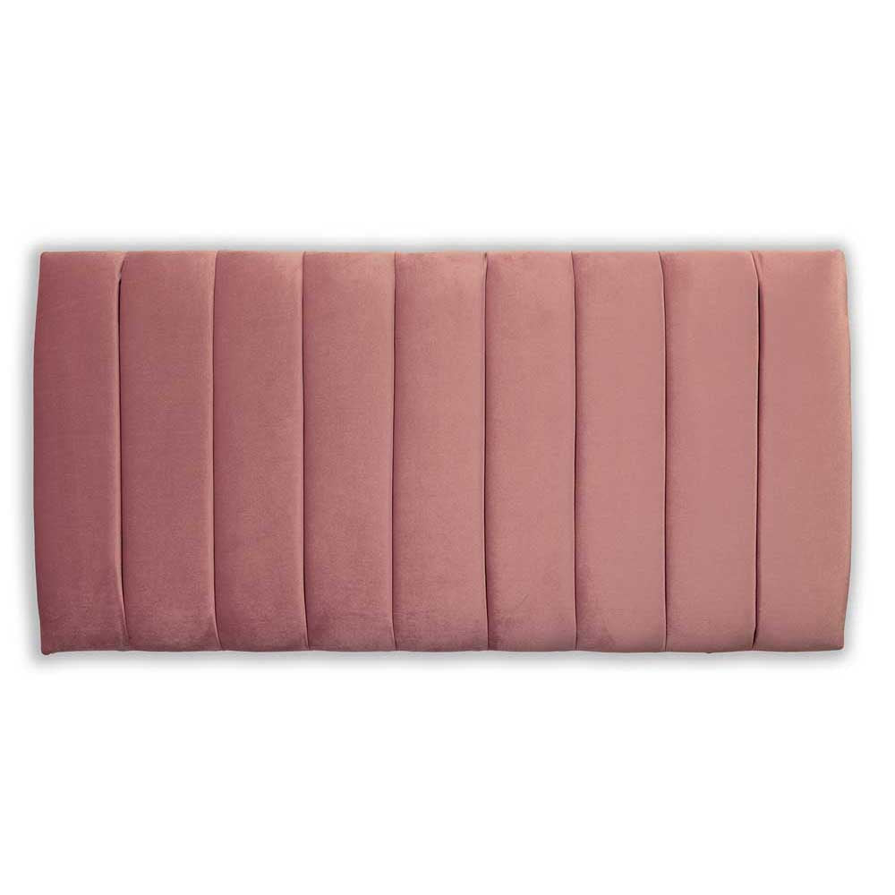 Pink quilted headboard on a white background