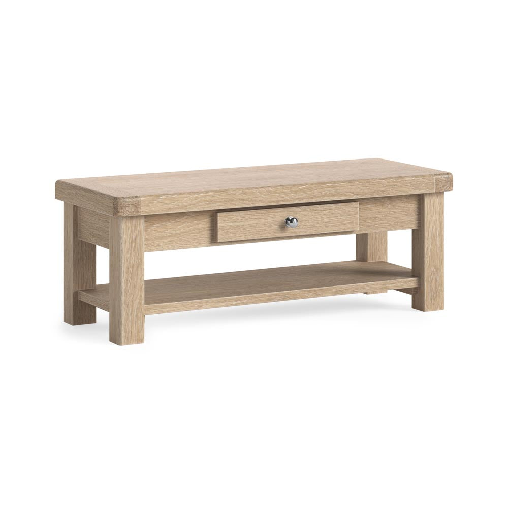 Wooden coffee table with a drawer on a white background