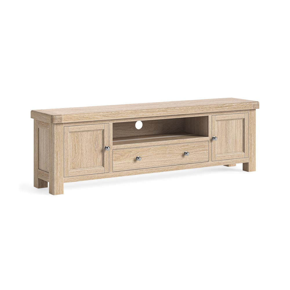 Wooden TV stand with two doors and two drawers on a white background