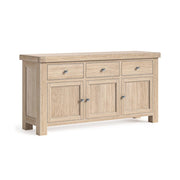 Wooden sideboard with three doors and three drawers on a white background