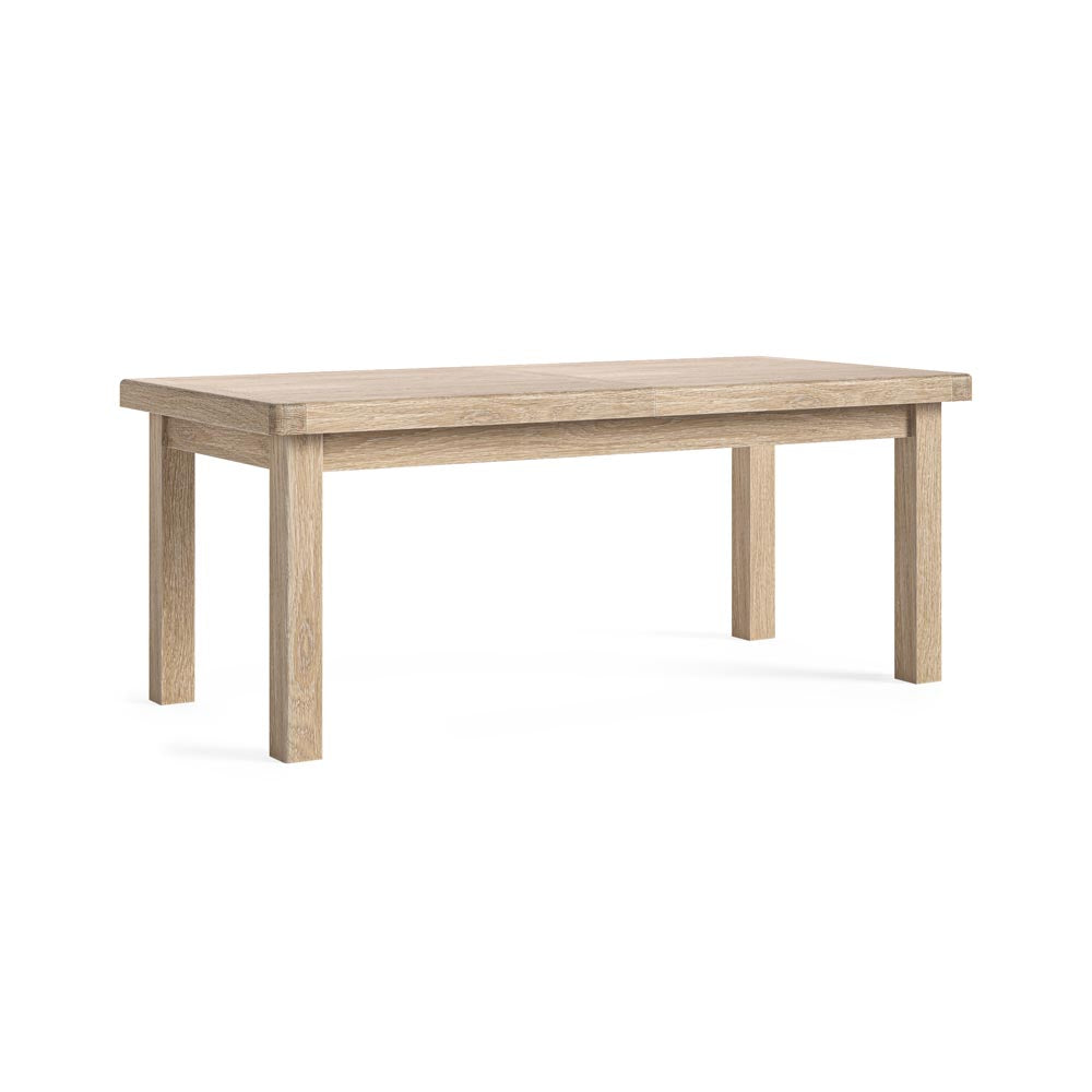 Wooden dining table on a white background