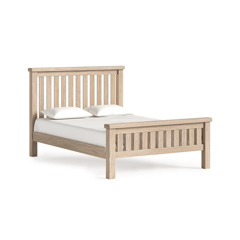 Wooden bed frame on a white background