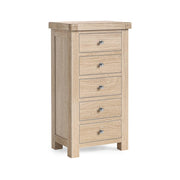 Wooden chest of drawers with five drawers on a white background