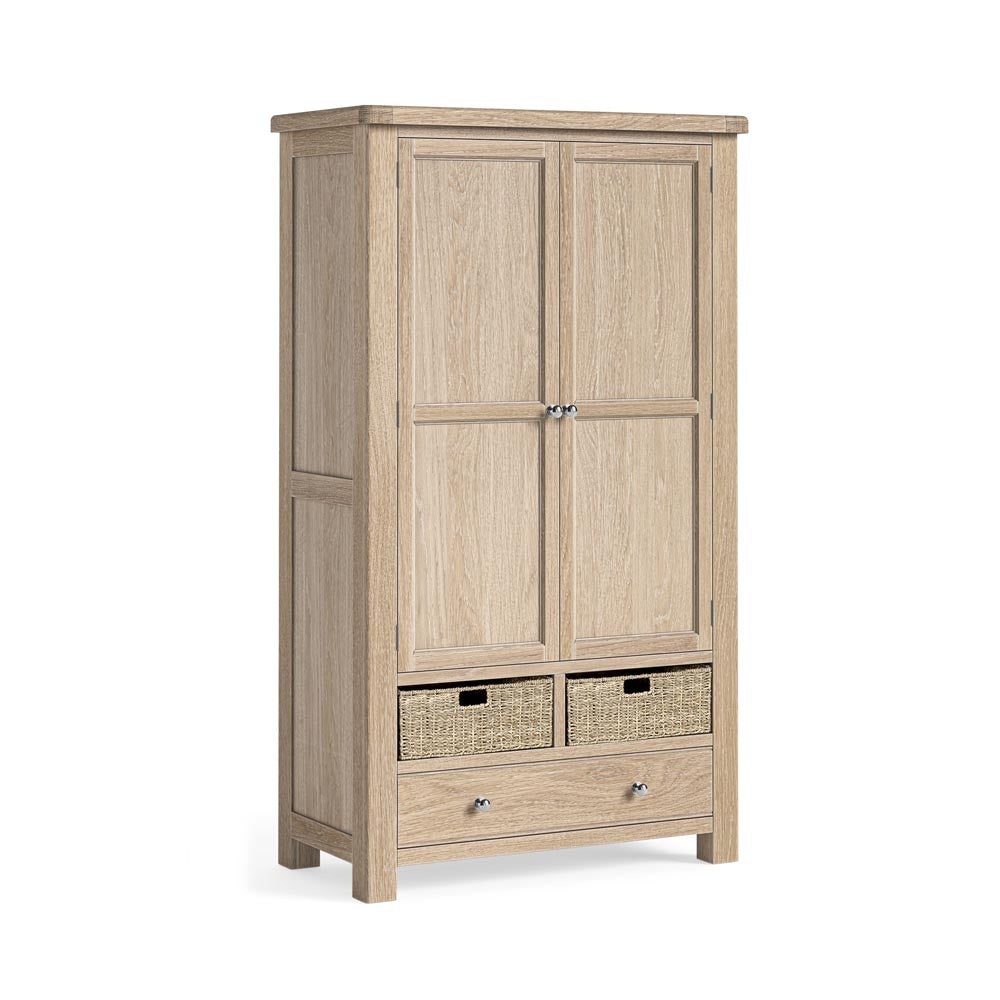 Wooden freestanding kitchen larder with two doors and two drawers on a white background