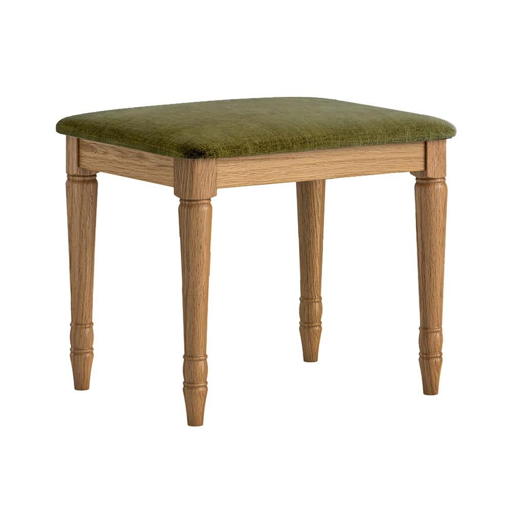 Wooden stool with an olive green cushion on a white background