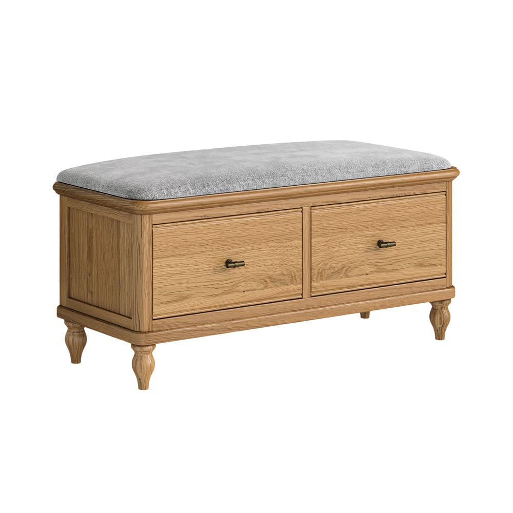 Wooden bench with two drawers and a grey cushion on a white background