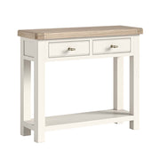 Console table with wooden top and white base on a white background