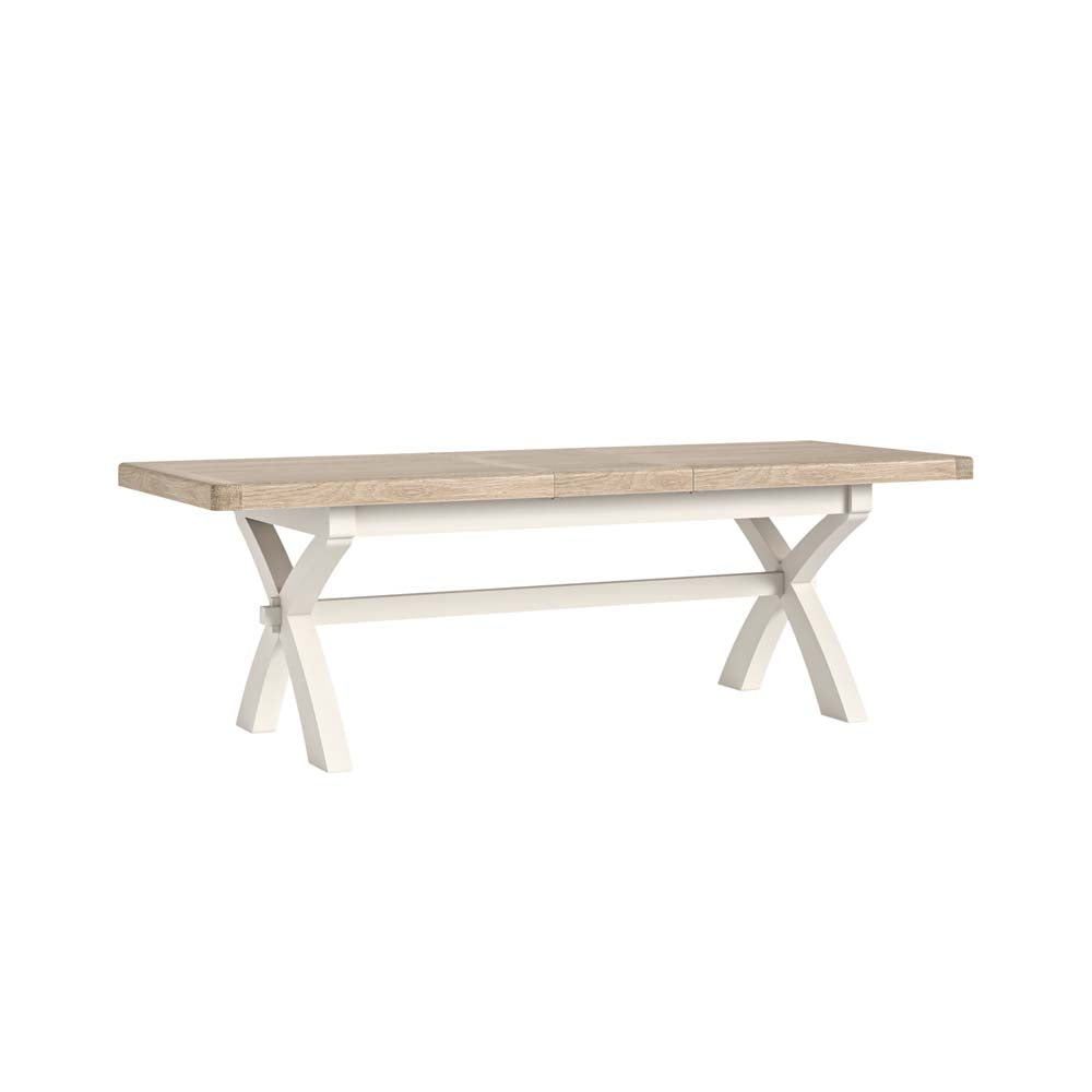 Oak dining table with white legs on a white background