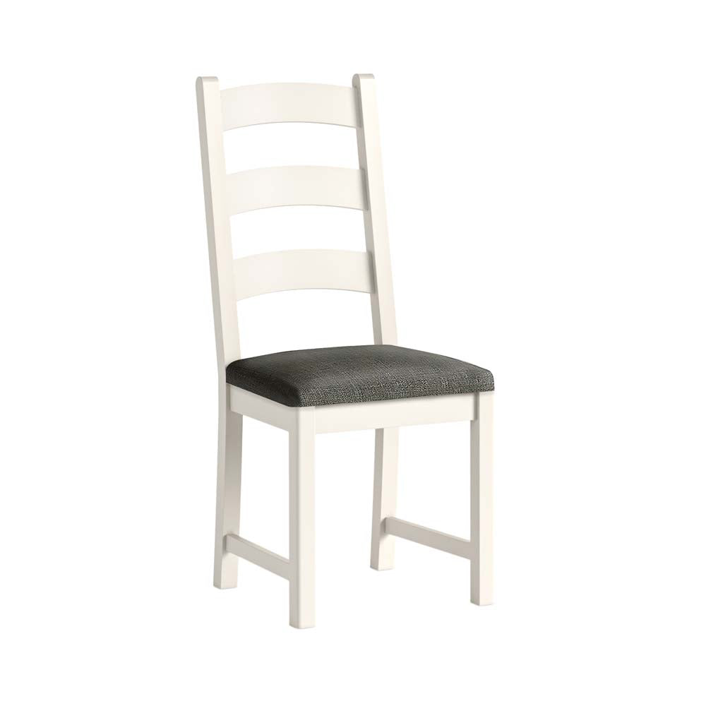 White chair with a black cushion on a white background