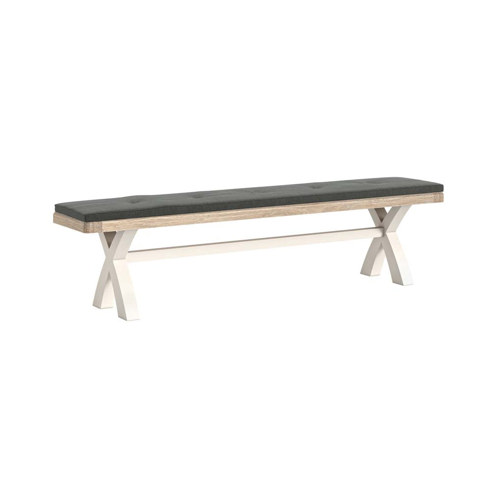 Oak cross leg dining bench with black cushion on a white background