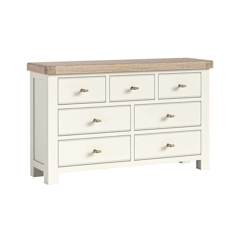 White dresser with seven drawers and a wooden top on a white background