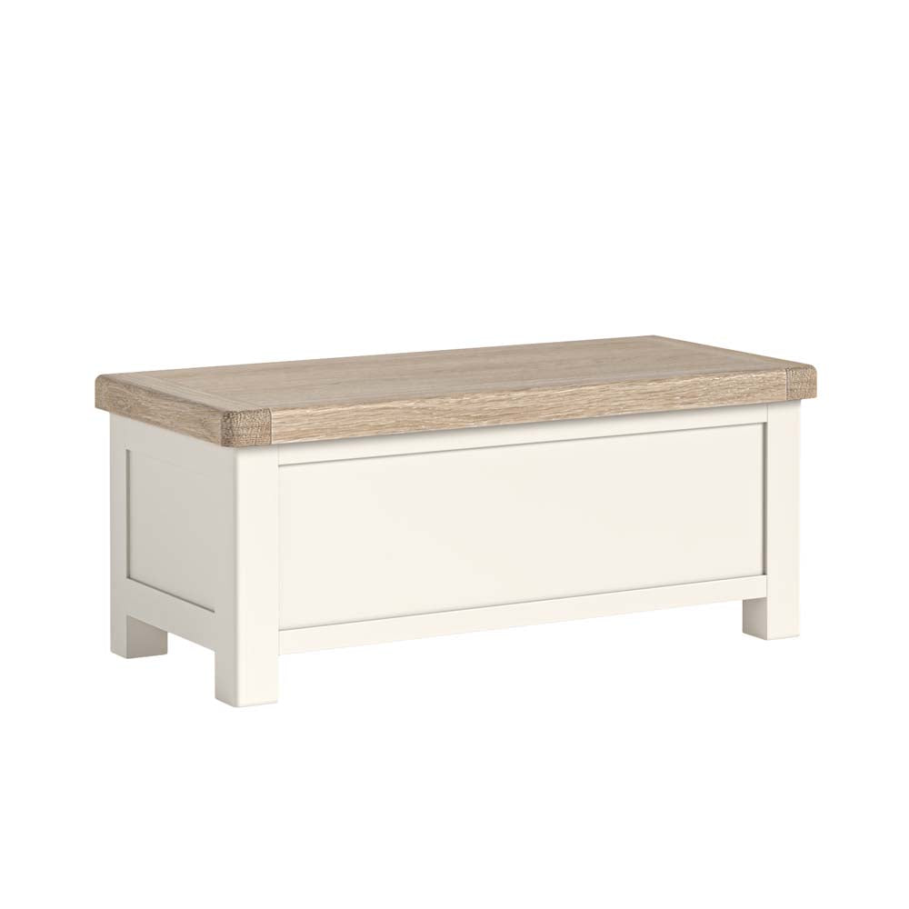 White blanket box with a wooden top on a white background