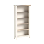 White bookshelf with four shelves on a white background
